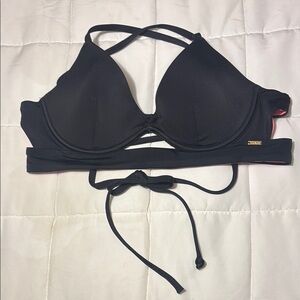 Pink Victoria’s Secret Black Strappy
Bikini Swim Top
